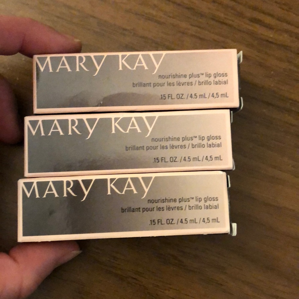 3 MK Lip Glosses